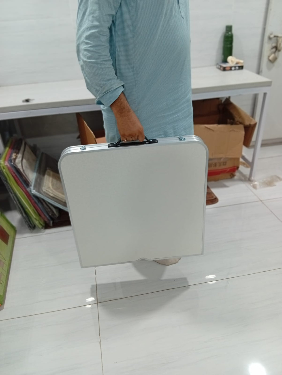 Folding adjustable table